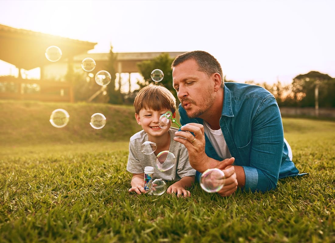 Personal Insurance - Young Family Spending Time Together Outdoors